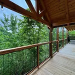 Out Of The Ashes Is A Brand New 3 Bedroom Cabin With High End Touches, Hot Tub, And A Mountain View!